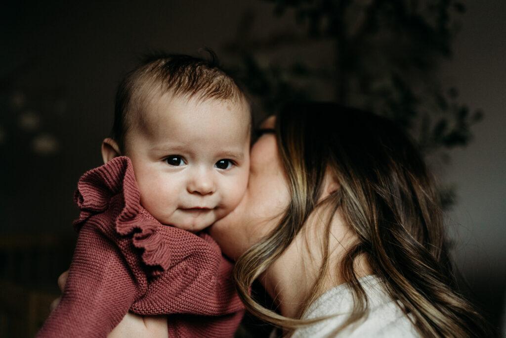 Mom holding baby Portland Newborn Photographer