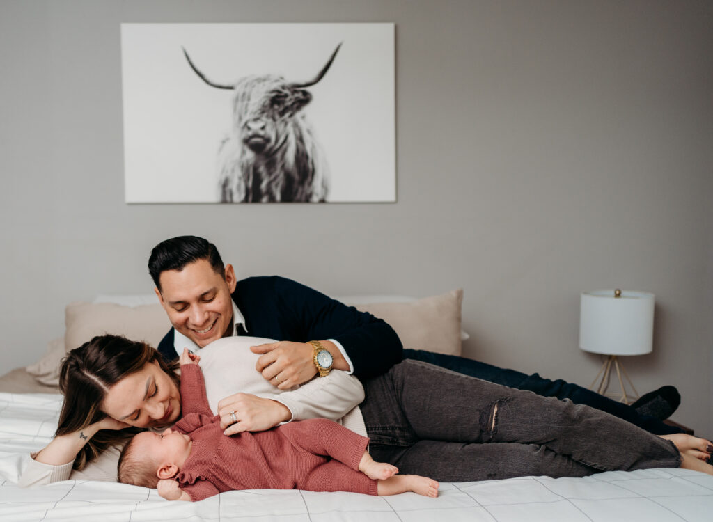 Family on bed in home Portland Newborn Photographer