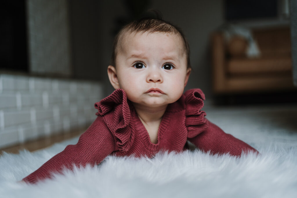 Baby on rug Portland Newborn Photographer
