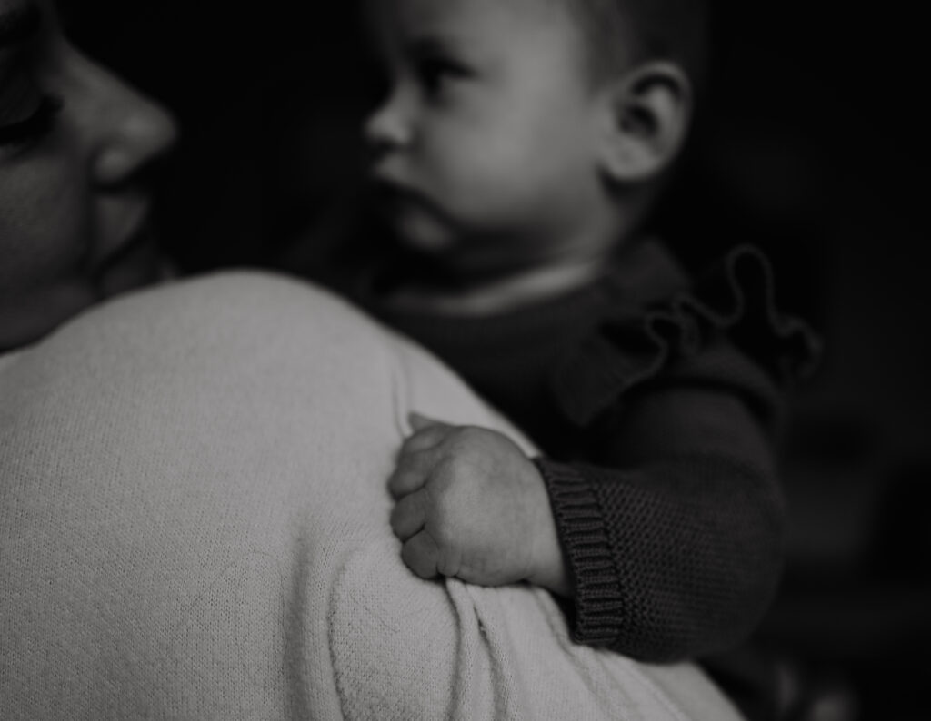Baby hand gripping mom Portland Newborn Photographer