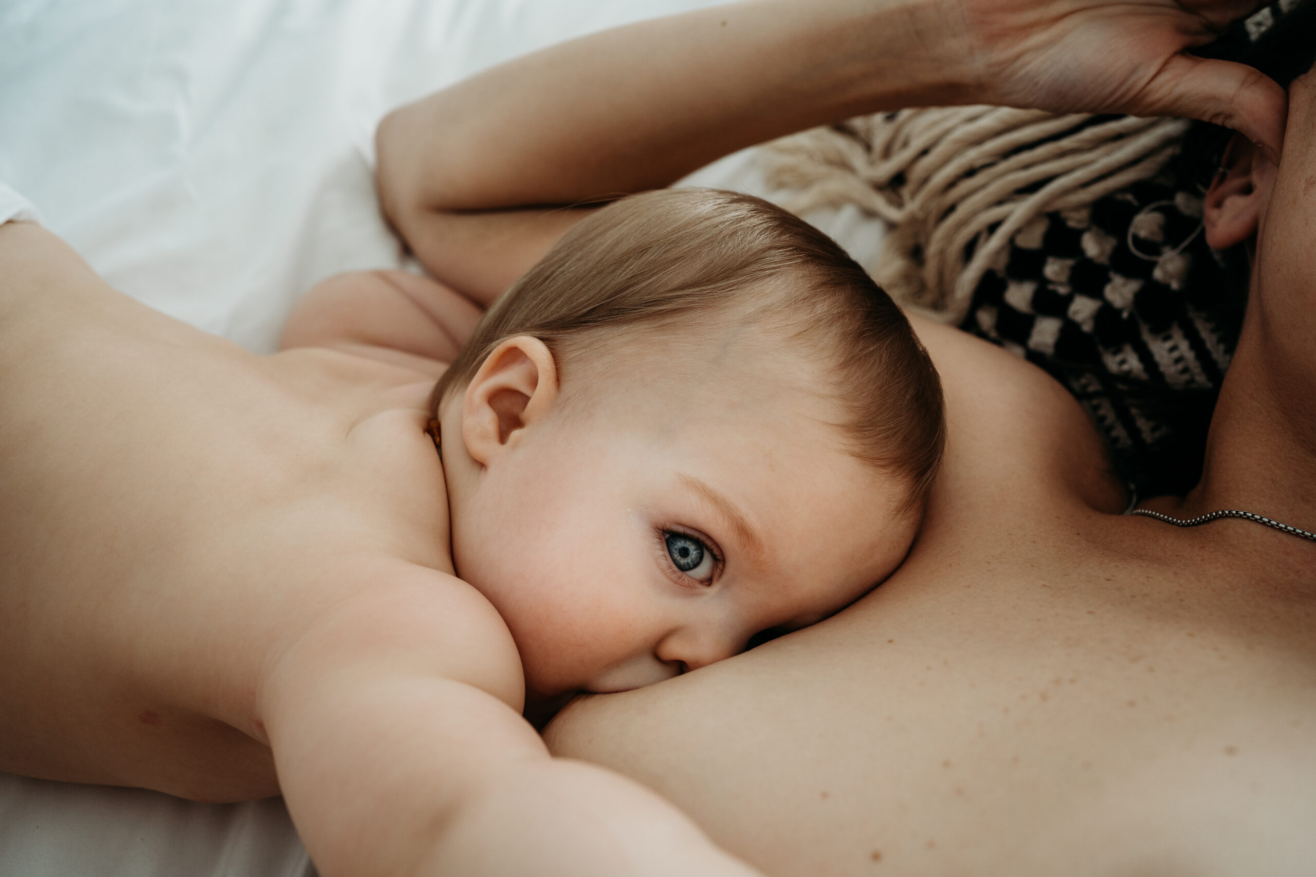 Nursing baby with mom Vancouver Birth Photographer